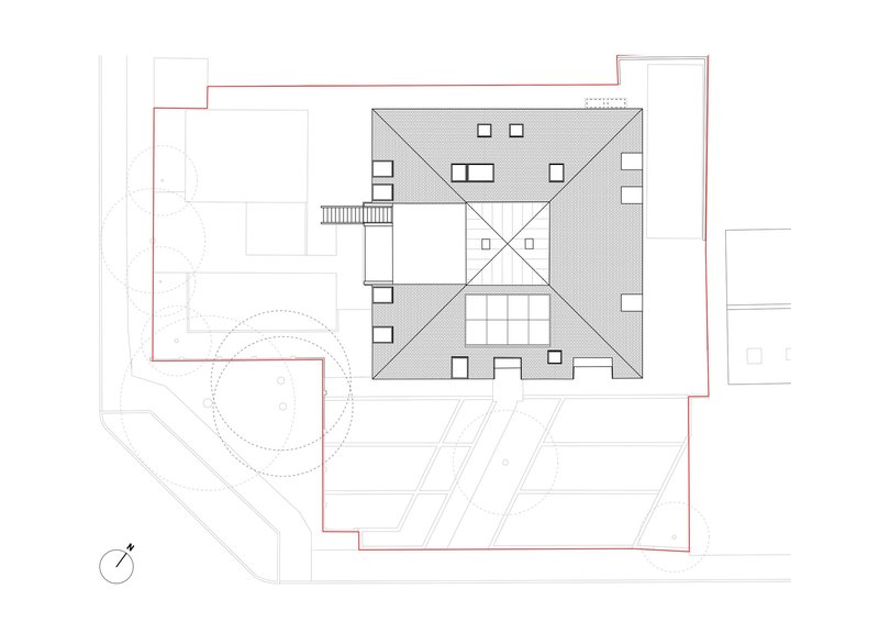 Roof plan drawing showing a square structure with central skylight and courtyard surrounded by adjoining volumes