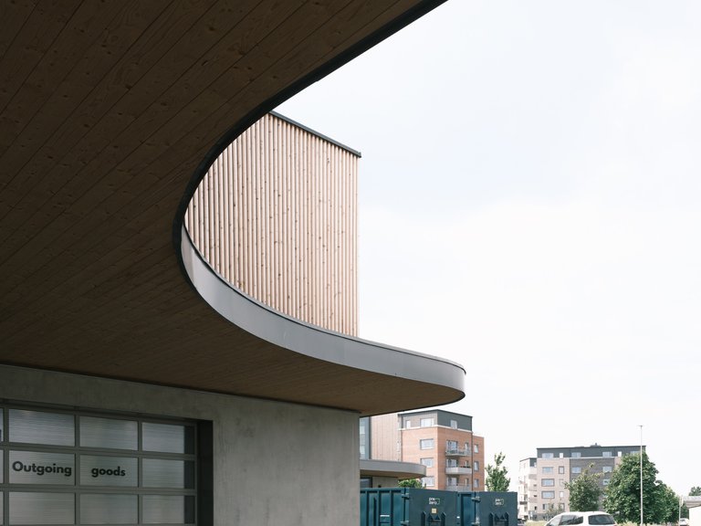 Johan Sundberg Wraps a Swedish Sticker Factory in an Undulating Timber Shell