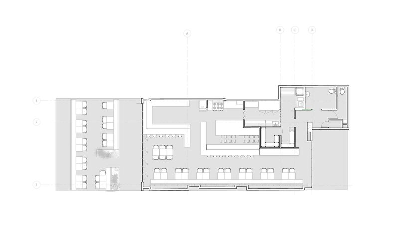 Floor plan showing a dining hall with rows of seating and service areas