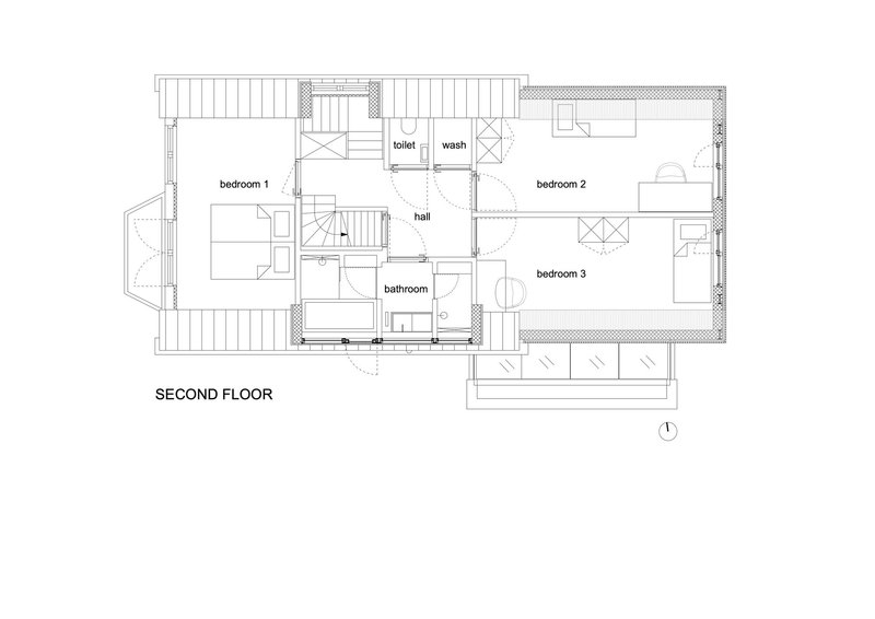 Floor plan drawing showing three bedrooms, bathroom, hall, and central staircase with balcony extension