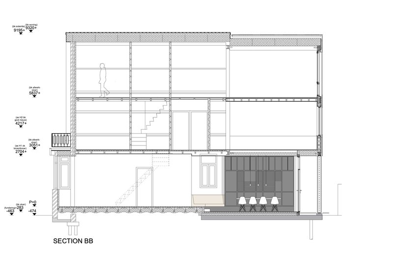 Section drawing showing three-level interior with central staircase and pendant lights above kitchen counter