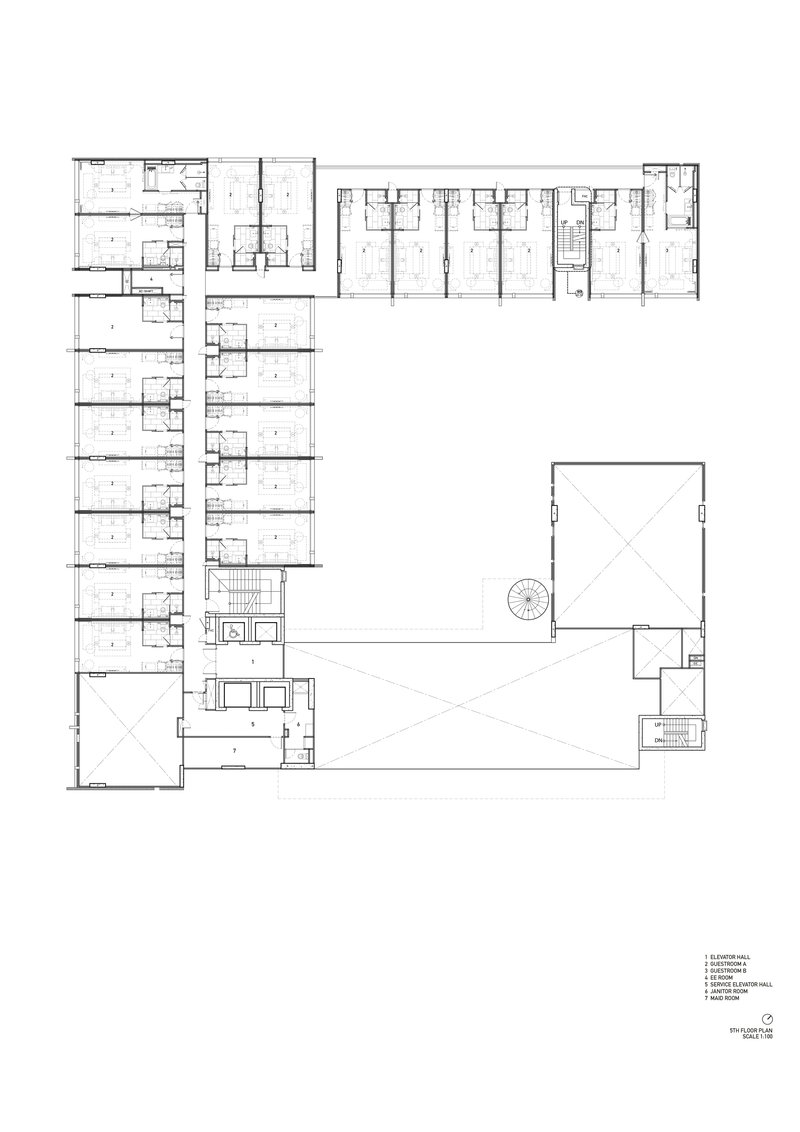 First floor plan drawing showing residential wings wrapping around large open courtyard space