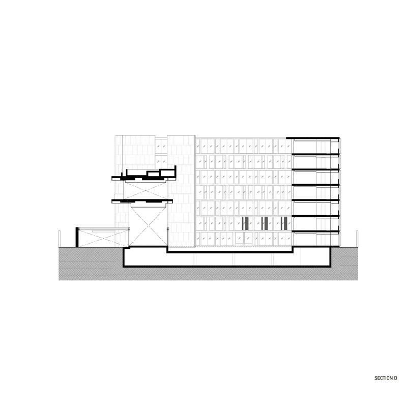 Section drawing showing volumes of varying heights with an open courtyard at lower levels