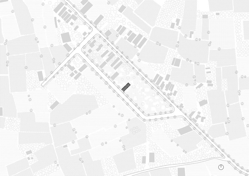 Site plan drawing showing a single structure within a triangular plot