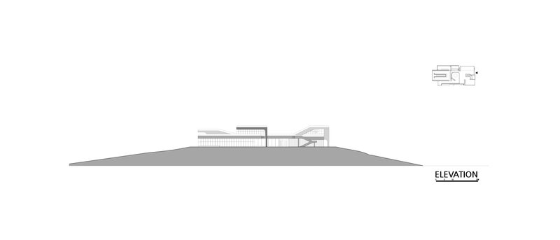 Elevation drawing showing the building nestled into a triangular hillside with varied roof volumes