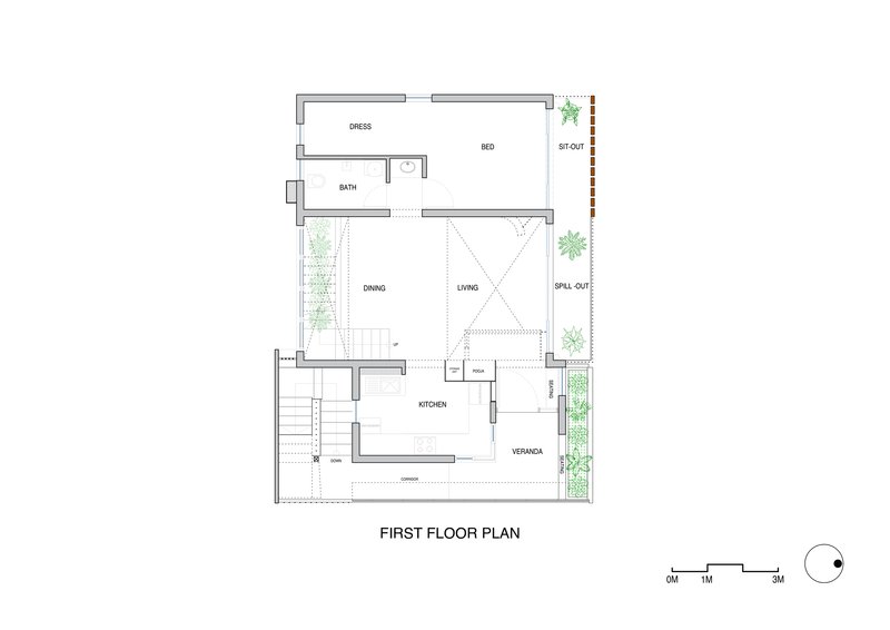 First floor plan drawing showing living, dining, and kitchen spaces with planted edges