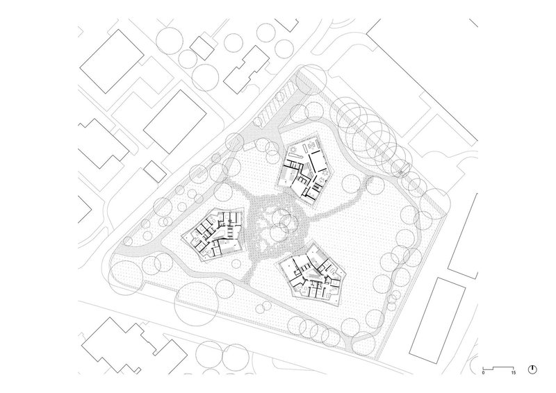 Ground floor site plan drawing showing three pentagonal buildings arranged around landscaped courtyards with tree planting