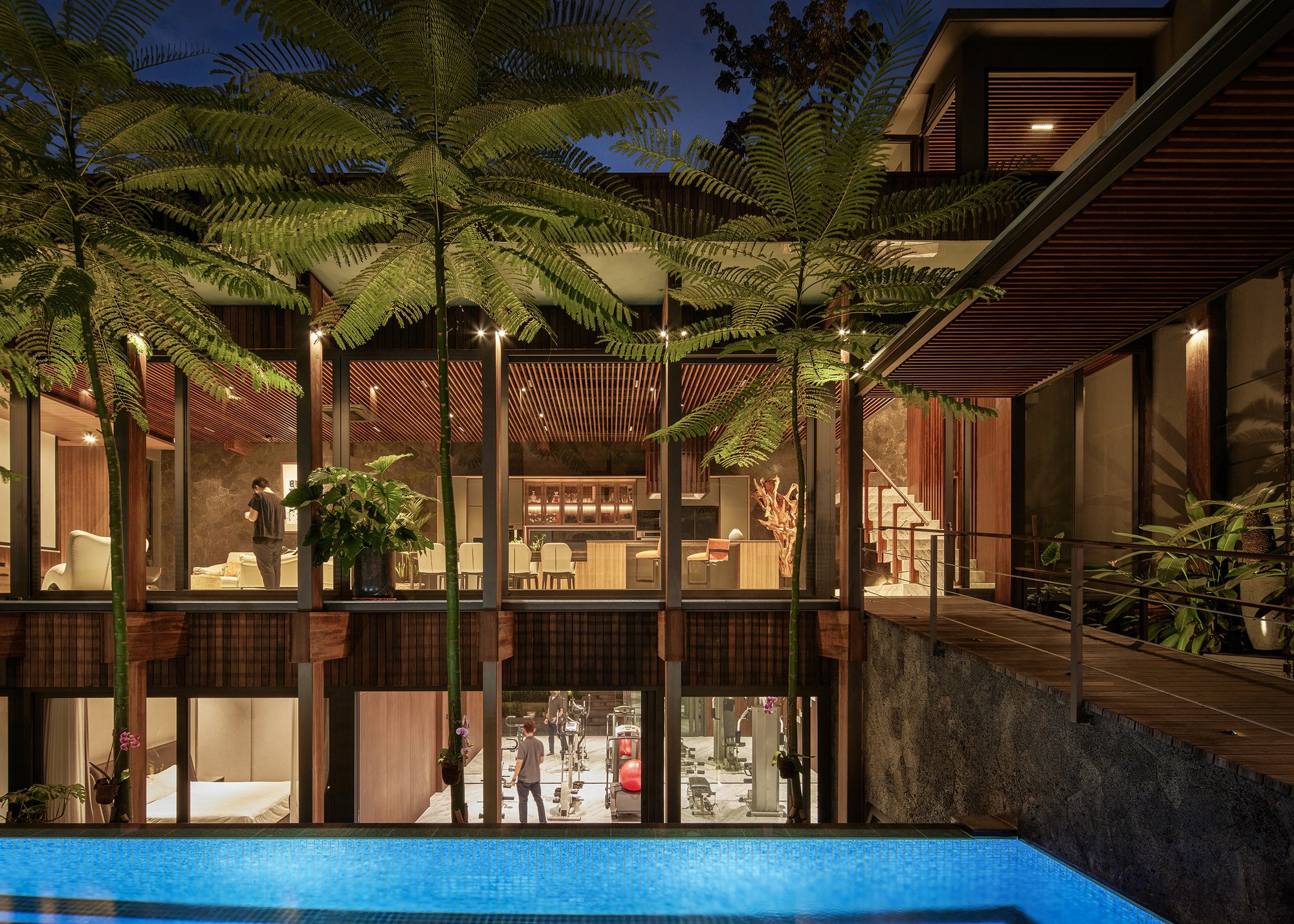 RCAB Studio Fuses Ironwood and White Marble into a Jakarta House That Grows from Its Neighbor