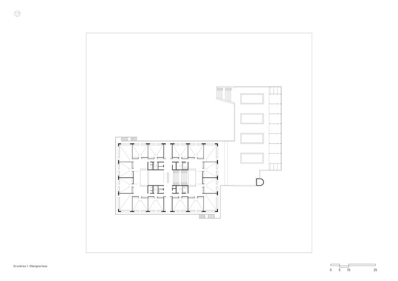 Floor plan drawing showing a rectangular block with residential units and an adjoining linear wing with four bays