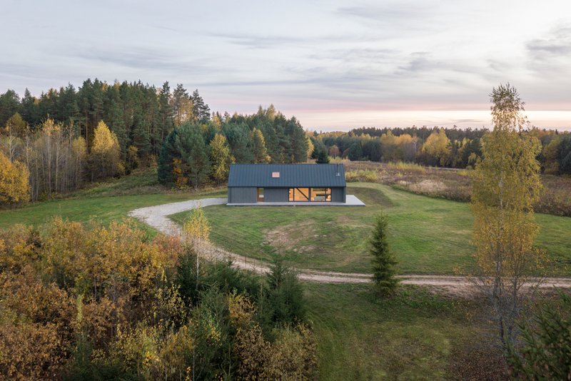 Devyni Architektai Builds an 80 m² Retreat for One Man and His Motorcycle in Rural Lithuania