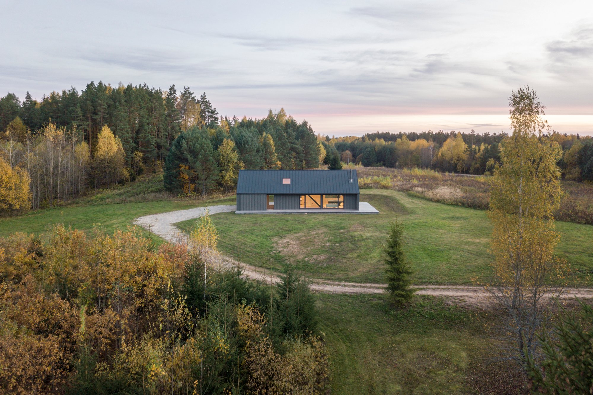 Devyni Architektai Builds an 80 m² Retreat for One Man and His Motorcycle in Rural Lithuania