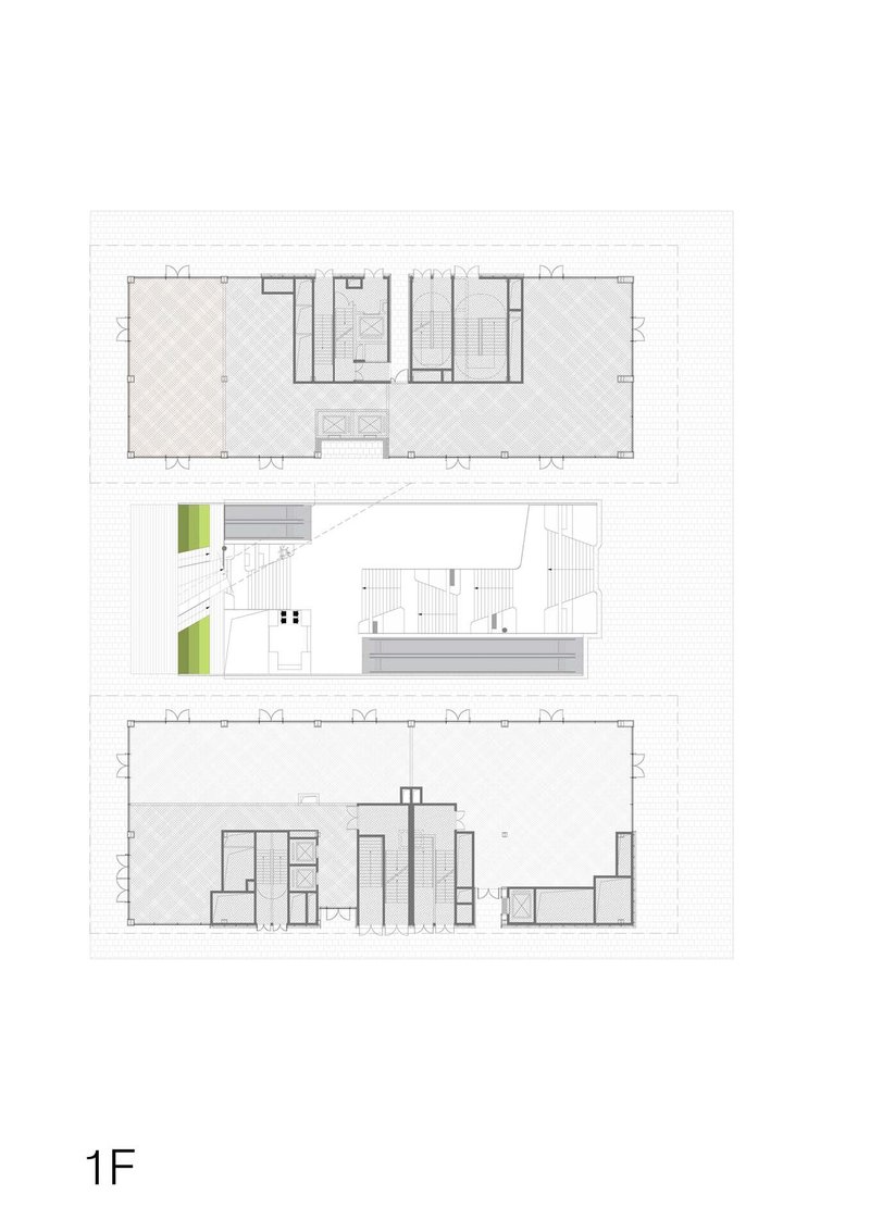Floor plan drawing showing open retail spaces with service cores and a terrace along one edge