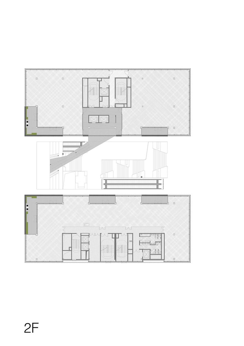 Floor plan showing two levels with central service cores and open flexible spaces with diagonal stair connection