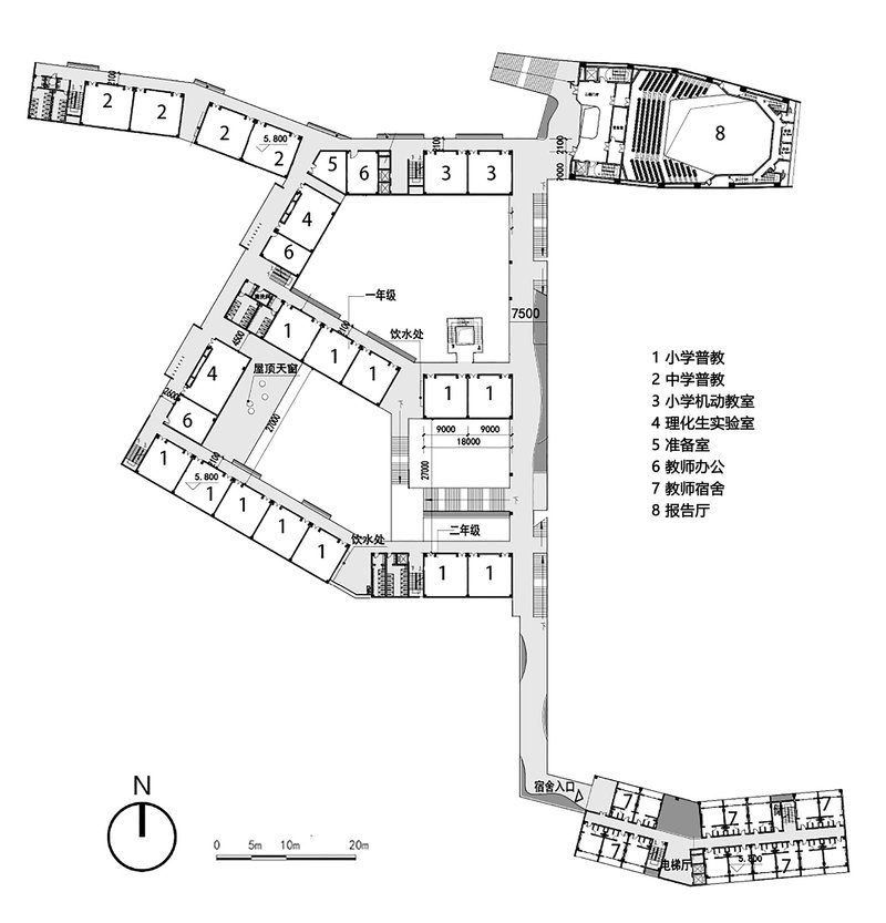 Floor plan showing an angled wing of classrooms with numbered program spaces and legend