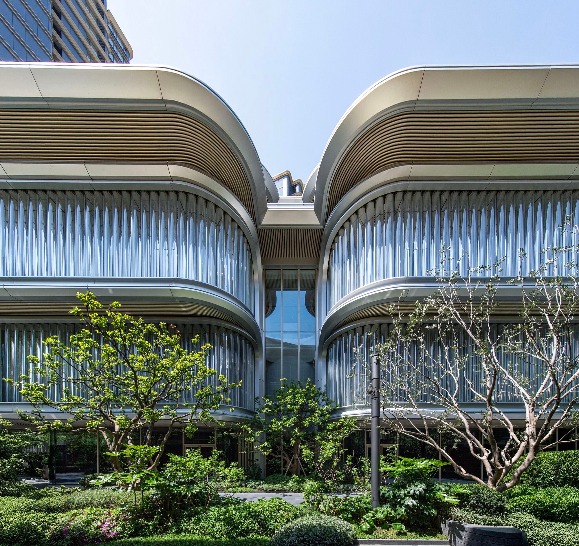 Foster + Partners Shapes a Petal-Form Gallery at the Edge of a Shanghai Park