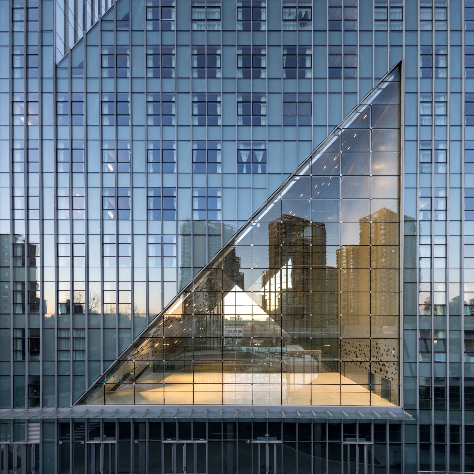 Zhu Xiaodi Architects and BIAD Carve Triangular Voids into a Beijing Talent Community