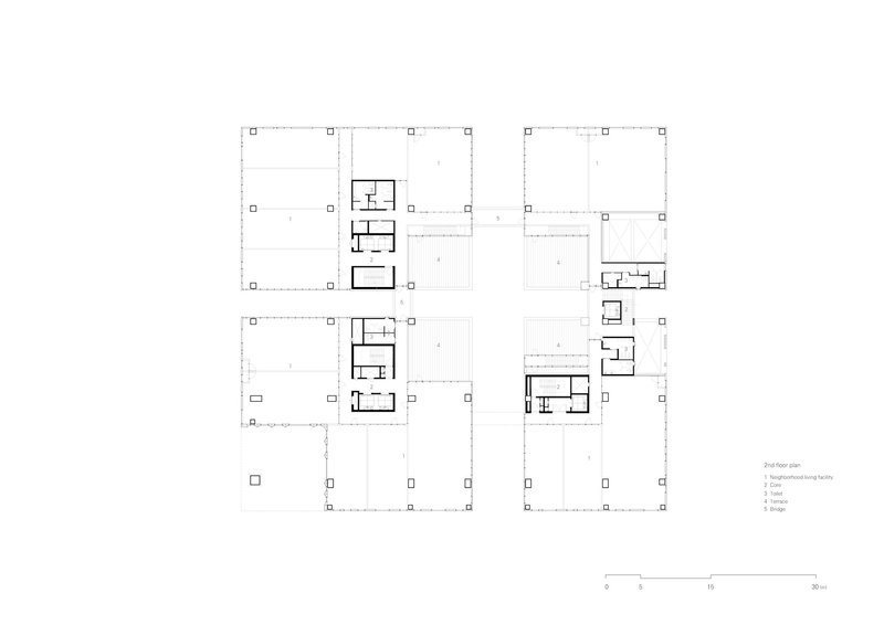 Floor plan drawing showing residential units distributed along a grid with courtyard spaces