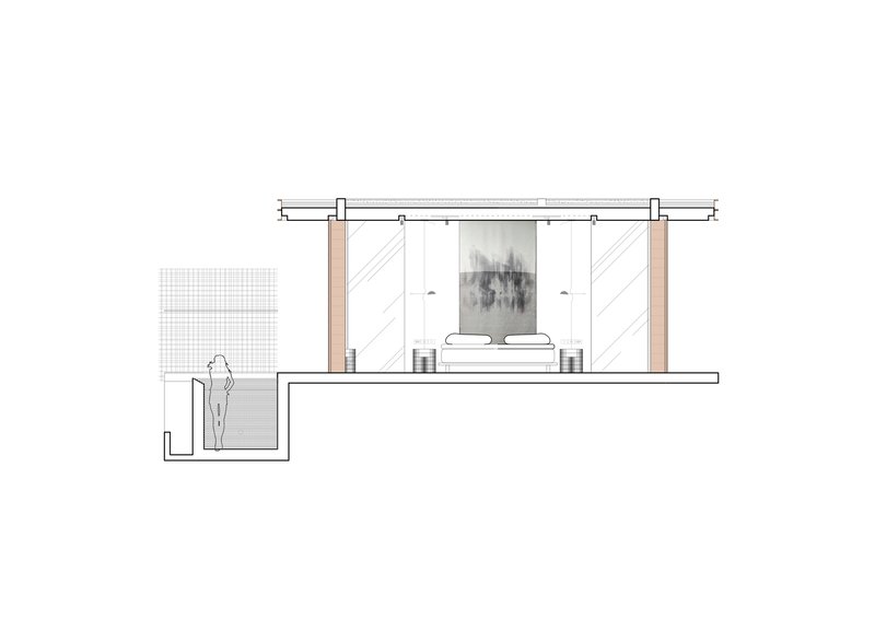 Section drawing showing a bedroom with sliding barn doors and an adjacent sunken bath