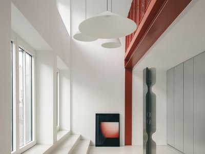 Three Studios Revive a Paris Printing House as a Red-Framed Workplace in the Sentier