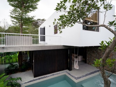 3fconcept Cantilevers a Concrete Block Over a Garden Oasis in Hue, Vietnam