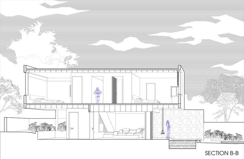 Section drawing showing double-height interior volume with upper balcony and planted surroundings