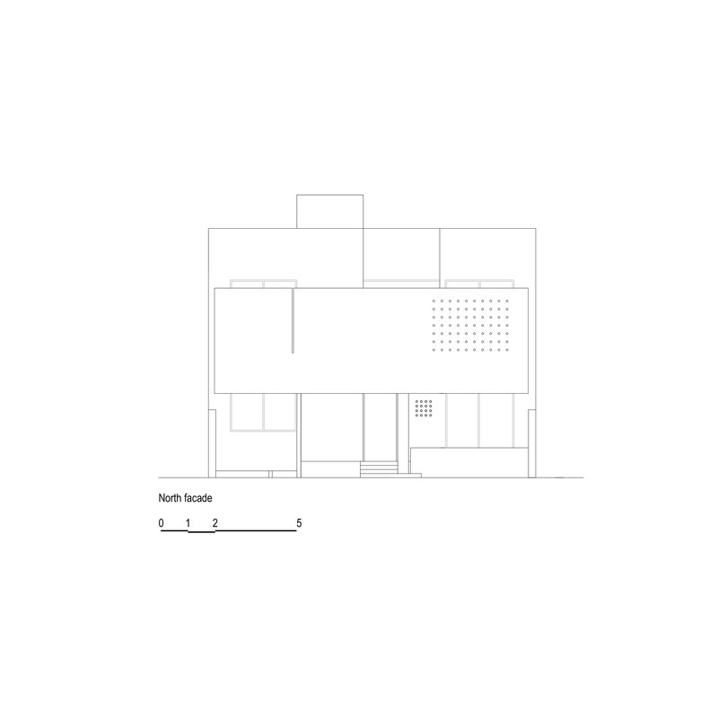 North facade elevation drawing showing stepped massing with grid of perforations on upper volume