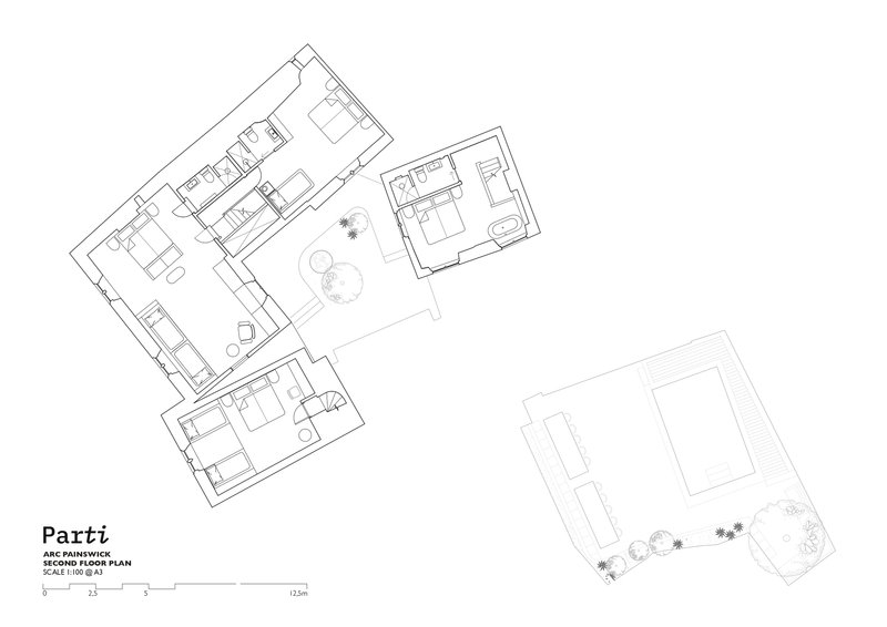 Second floor plan drawing showing angled rooms around a central courtyard with outbuilding