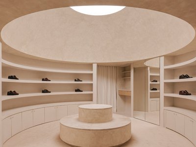 Estudio DIIR Wraps a 60-Square-Meter Shoe Store Around a Limestone Dome in Madrid