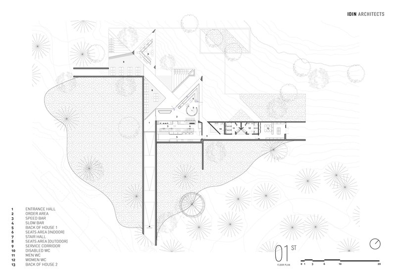 Floor plan drawing showing elongated bar layout with surrounding landscape and tree canopies