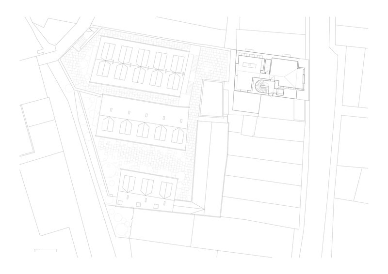 Roof plan drawing showing the sawtooth gable rooflines of the housing blocks and adjacent building