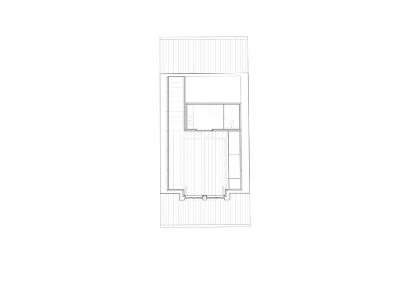 Floor plan drawing showing a rectangular volume with central courtyard and surrounding deck