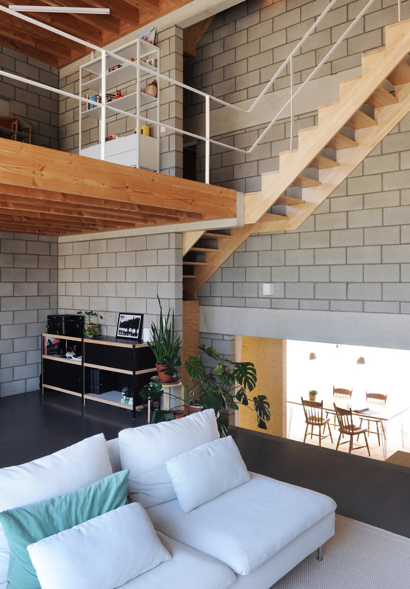 UR Architects Carve a Split-Level Family Home into a Belgian Sand Ridge