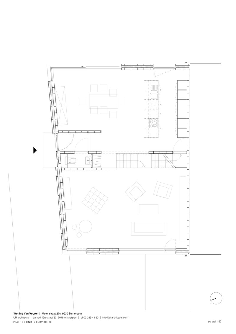 Floor plan drawing showing the ground level with dining area, kitchen island, stair, and living spaces
