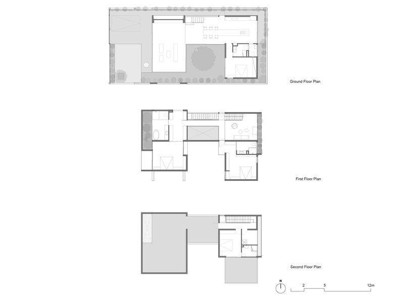Floor plan drawings showing ground, first, and second levels with central courtyard and staircase circulation