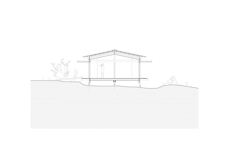 Section drawing showing the pitched-roof structure with figures inside elevated on pilotis above the undulating landscape