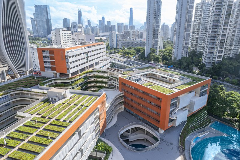UASZ Folds an Entire School into an Infinity Garden Between Shenzhen's Towers