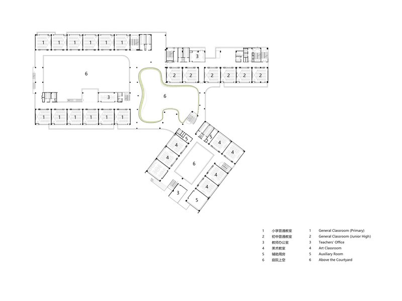 Floor plan drawing showing two linked wings with classrooms arranged around a central courtyard