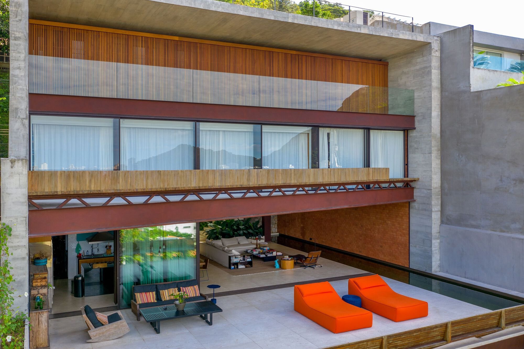Miguel Pinto Guimarães Stacks Concrete Terraces into Rio's Forest Canopy at MB House