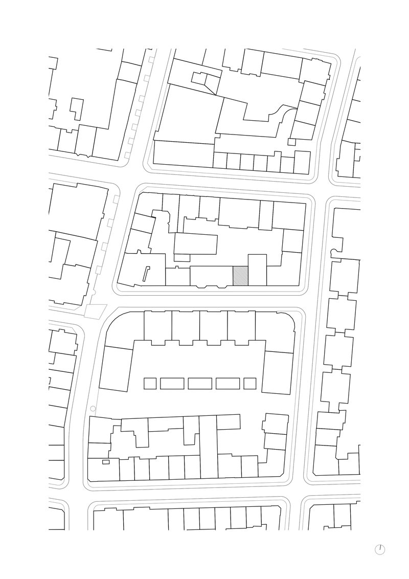 Site plan drawing showing building footprints and streets in an urban block layout