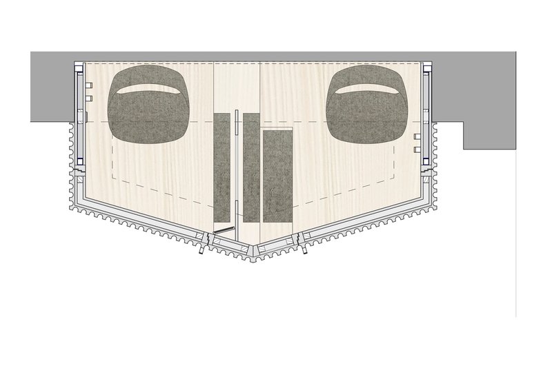 Floor plan drawing showing twin confessional volumes with curved seating areas and central entry