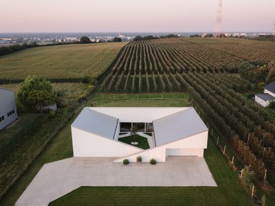 SOURCE Architecture Studio Turns a Polish Planning Rule into a Walkable Roof Hill