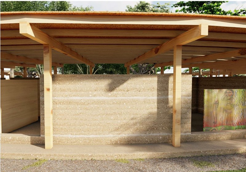 Rammed earth walls and timber structure showcase sustainable architecture through local materials.