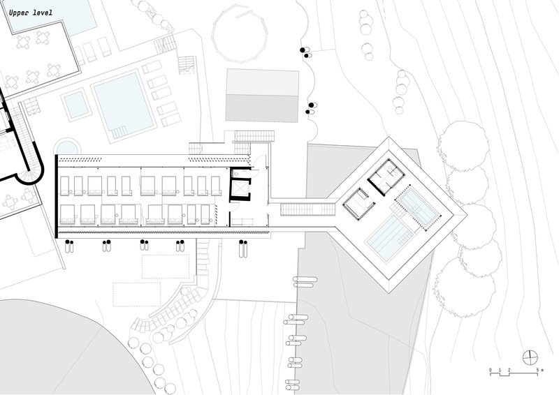 Upper level floor plan drawing showing the pool deck and angled secondary volume