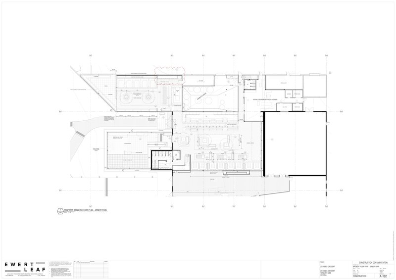 Floor plan drawing depicting multiple dining zones, restrooms, and service areas in an irregular layout