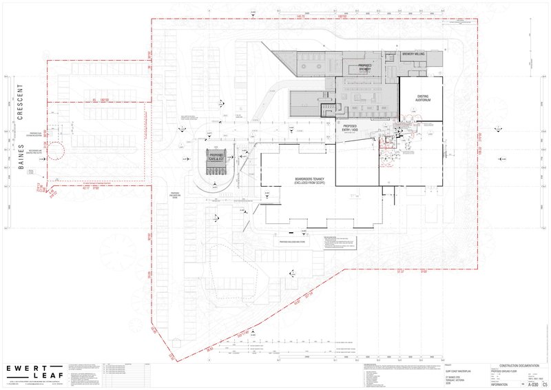Site plan drawing showing building footprint with parking areas and landscaping elements outlined in red