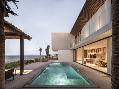 Ápiron Builds a Yucatán Beach House from Stone, Concrete, and Woven Reeds