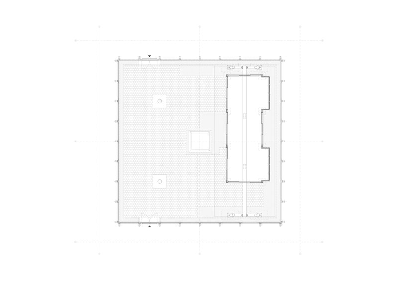 Roof plan drawing showing a rectangular volume positioned on a textured surface with circular elements