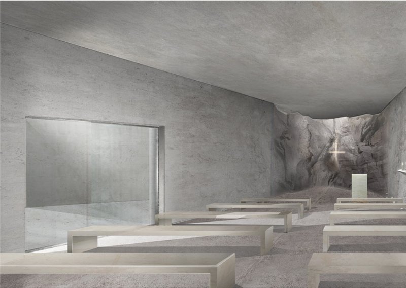 The underground prayer hall leads worshippers toward a carved stone altar.
