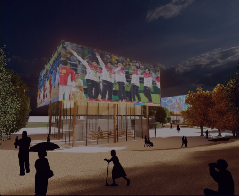At night, the building becomes a glowing media pavilion, turning public space into a collective sports experience.