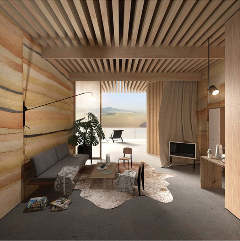 Warm timber interiors and rammed earth walls connect the hospitality spaces with the material character of the landscape.